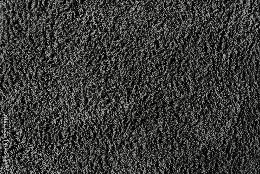 Fototapeta premium stylish plain background in loft style,shaggy carpet,close-up of shaggy gray carpet for the floor,carpet fabric texture,close-up of shaggy carpet