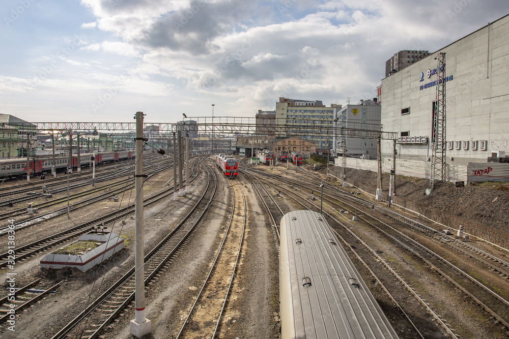 Obraz premium Parking of freight and passenger trains in the Krasnoselsky city district. Moscow, Russia