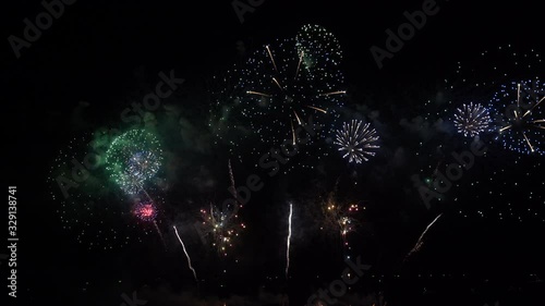 Colorful fireworks on black background.