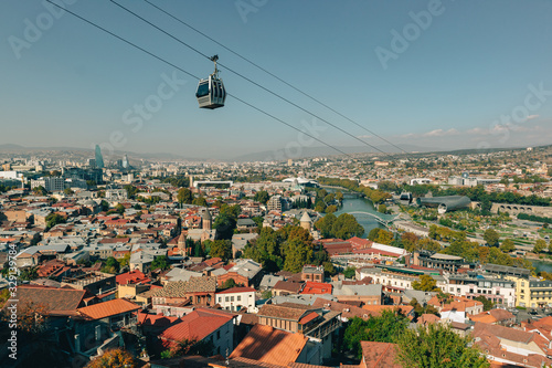 Cityscape view from mountain of Tbilisi old town with cable car in Georgia.