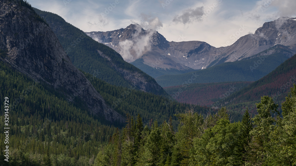 Scenic view of mountain range, Yellowhead Highway, Icefields Parkway, Jasper National Park, Alberta, Canada Scenic view of mountain range, Yellowhead Highway, Icefields Parkway, Jasper National Park, Alberta, Canada