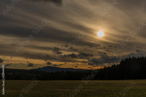 Field and hills near Velesin town in sunny day in south Bohemia photo