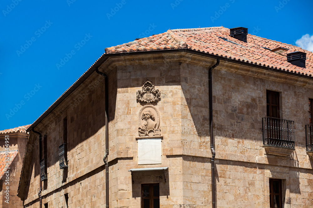Beautiful architecture of the antique buildings around at Calle Melendez in Salamanca old city