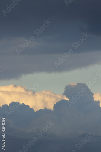 powerful and active white cumulonimbus cloud in a deep blue sky © Francis