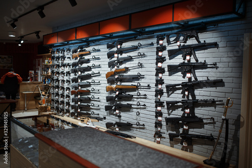 Bild auf Leinwand Rifle choice, showcase in gun shop, nobody