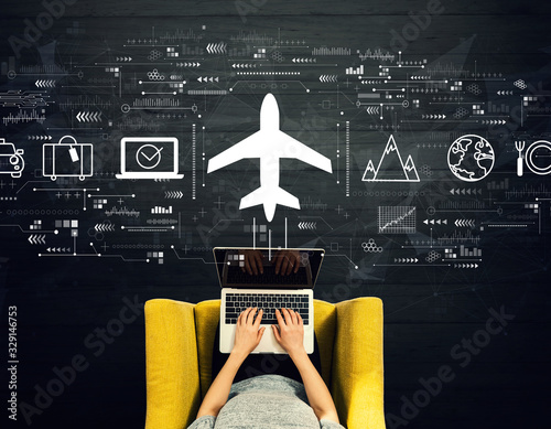 Flight ticket booking concept with person using a laptop in a chair