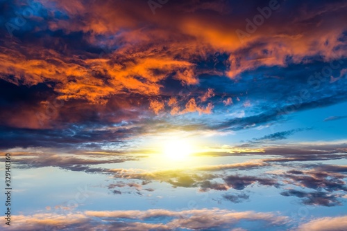  Beautiful sunrise . Beautiful heavenly landscape with the sun in the clouds .