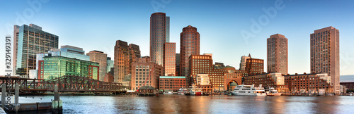 Downtown panoramic city view of Boston Massachusetts looking over the riverfront harbor from Fan Pier Park © Aevan