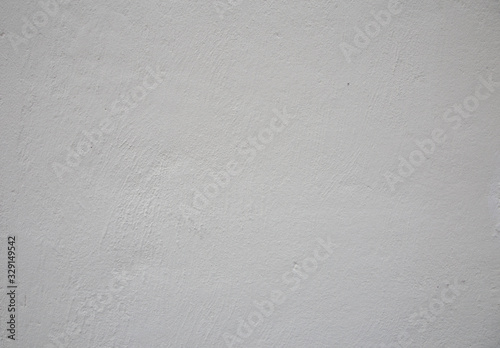 White grunge cement wall for texture background.