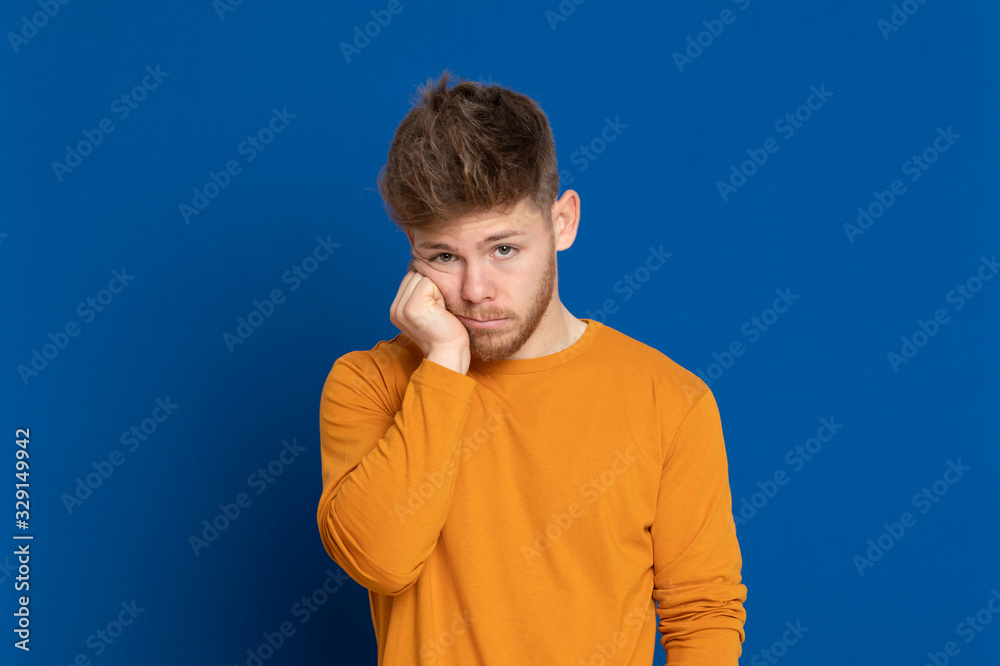 Attractive young guy with a yellow T-shirt Attractive young guy with a yellow T-shirt