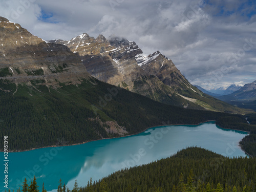Lake with mountain range in the background, Peyto Lake, Banff National Park, Alberta, Canada