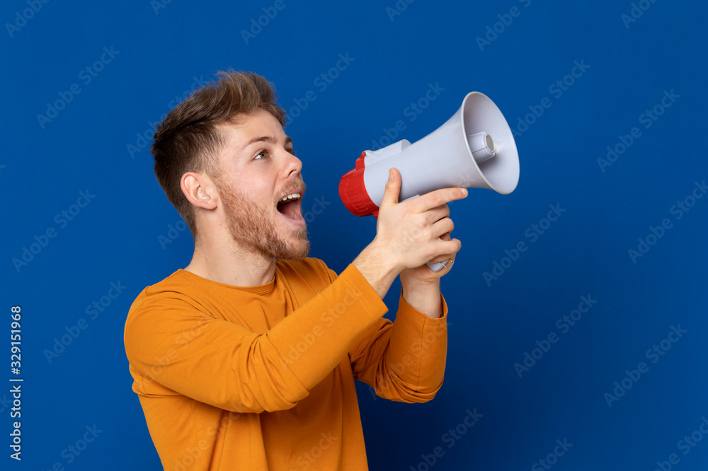 Attractive young guy with a yellow T-shirt