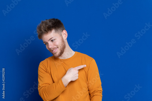 Attractive young guy with a yellow T-shirt