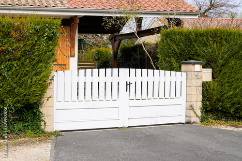 white metal aluminum house gate and slats