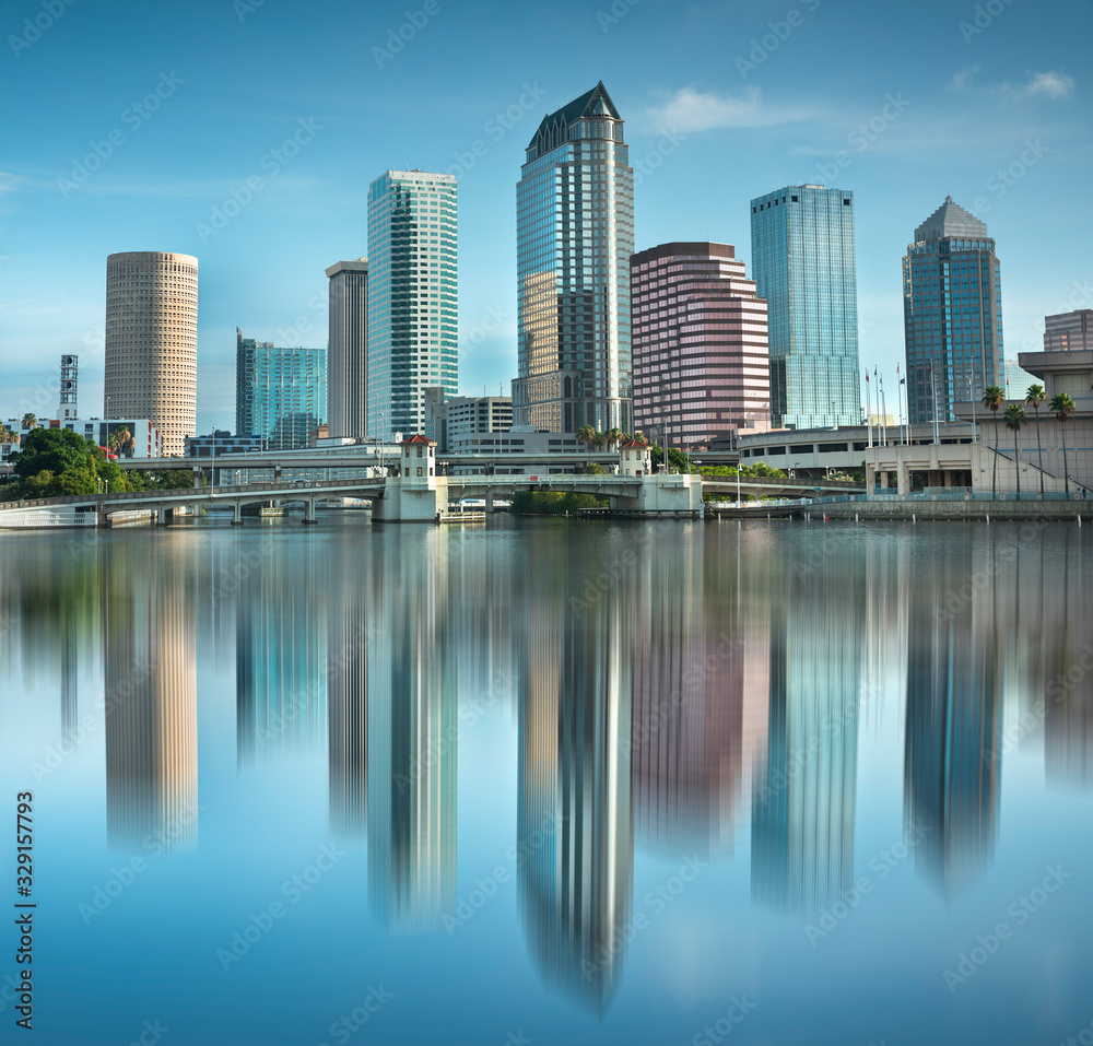 Fototapeta premium Downtown city skyline view of Tampa Florida USA looking over the Hillsborough Bay and the Riverwalk