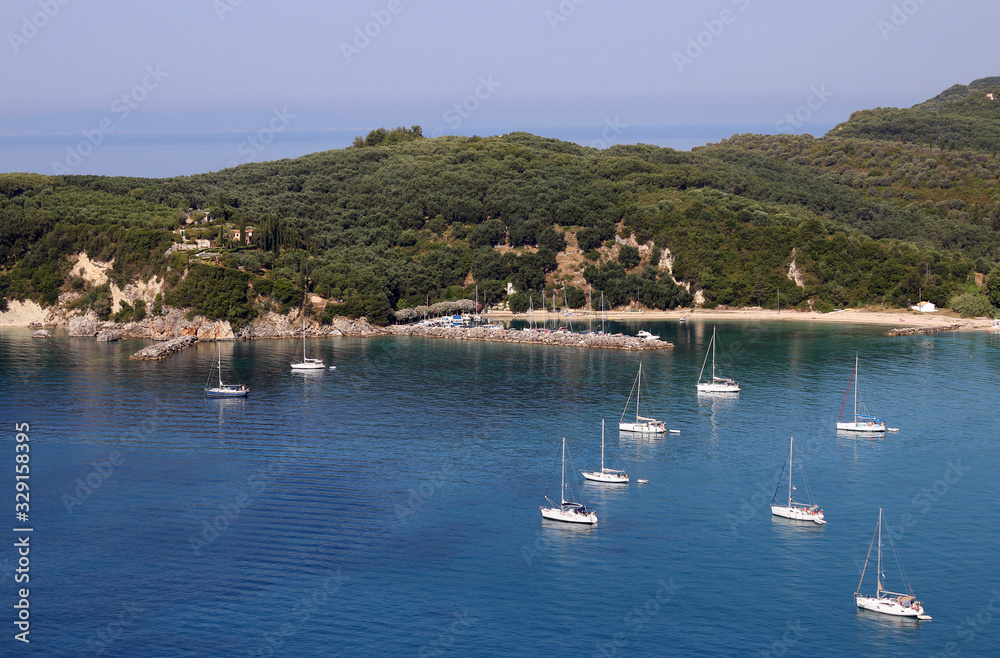yachts and sailboats on Valtos beach Parga Greece