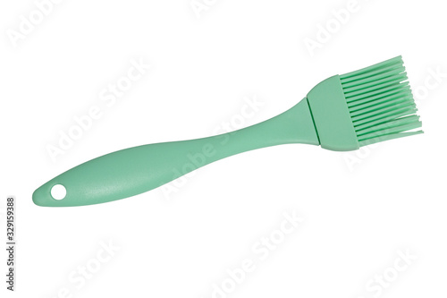 Green culinary brush  kitchen utensil. Isolated on white background