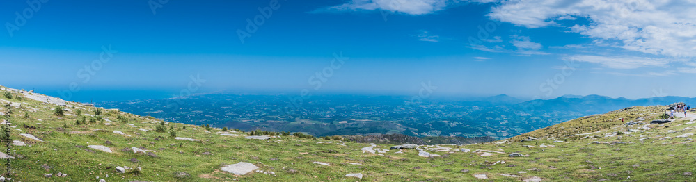 Panorama of the Pyrenees mountains and Spain on the Rhune