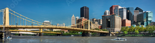 City skyline panoramic view over the Allegheny River and Roberto Clemente Bridge in downtown Pittsburgh Pennsylvania USA © Aevan