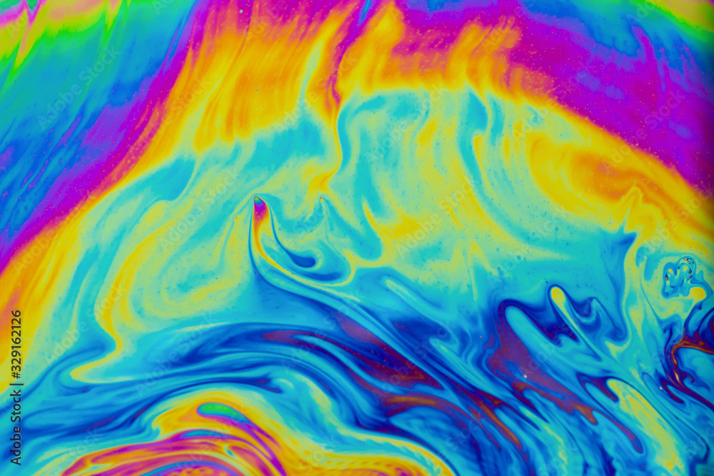 Psychedelic multicolored patterns background. Photo macro shot of soap bubbles Psychedelic multicolored patterns background. Photo macro shot of soap bubbles