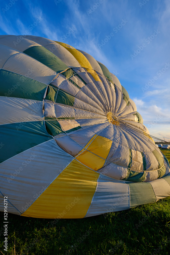 Obraz premium Aerostatic balloon in inflation process with sewn patches.