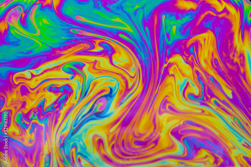 Psychedelic multicolored patterns background. Photo macro shot of soap bubbles © Achira22