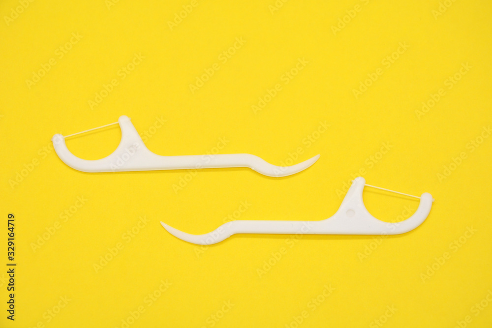 toothpick and dental floss isolated toothpick and dental floss isolated