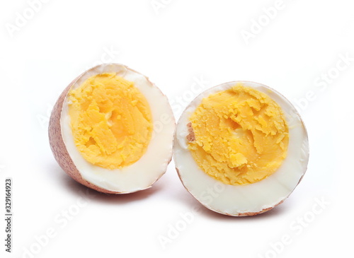 Fresh boiled eggs half isolated on white background