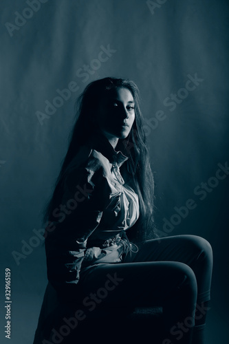 Teen girl in stylish clothes. Trend photos in 90s style. Toning photos with highlights.