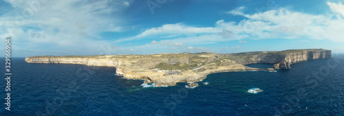 Aerial view of Sea Tunnel near Azure window. Dwejra is a lagoon of seawater on the Gozo island.Malta