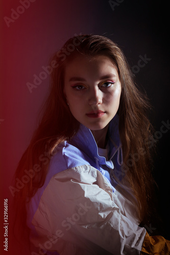 Teen girl in stylish clothes. Trend photos in 90s style. Toning photos with highlights.