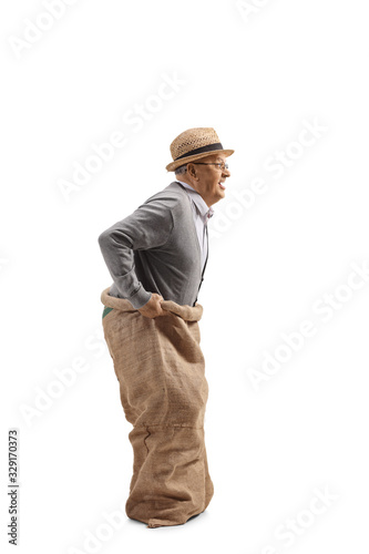 Elderly man inside a sack ready to jump
