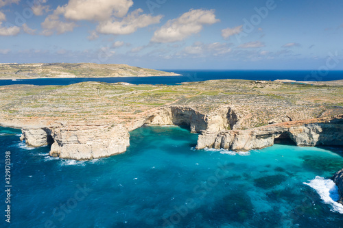 Aerial drone photo - The famous Blue Lagoon in the Mediterranean Sea. Comino Island, Malta.