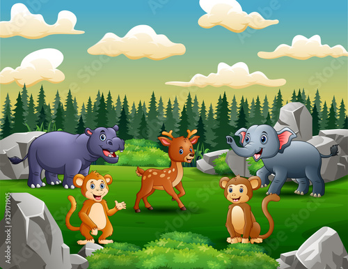 Happy wild animals living in the green field