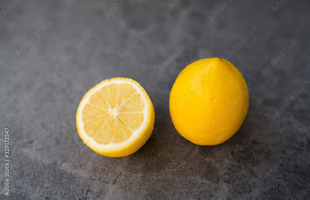 yellow lemon cutaway on a gray background yellow lemon cutaway on a gray background