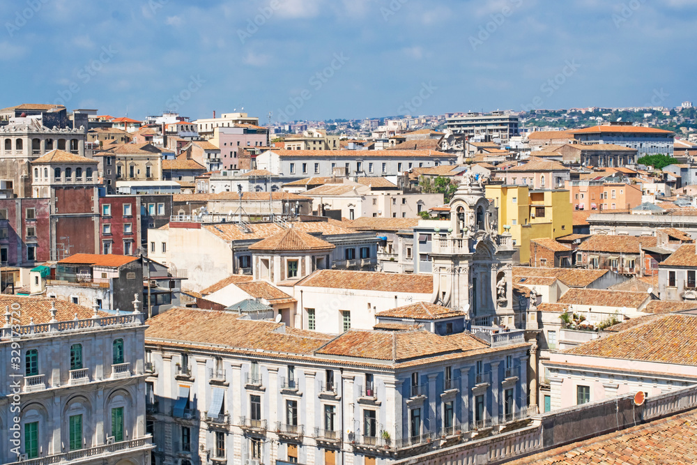 Aerial skyline panoramic view of Catania old town featuring brown and yellow roofs. Sicily, Italy 