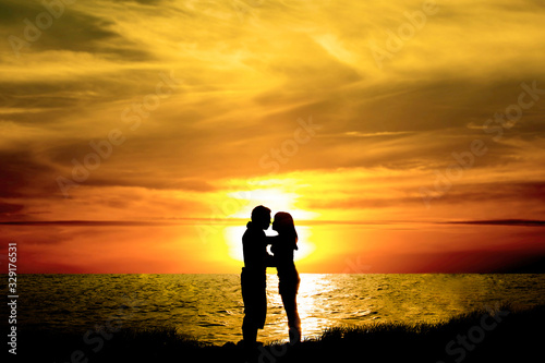 romantic couples, young handshake at sunrise or sunset.