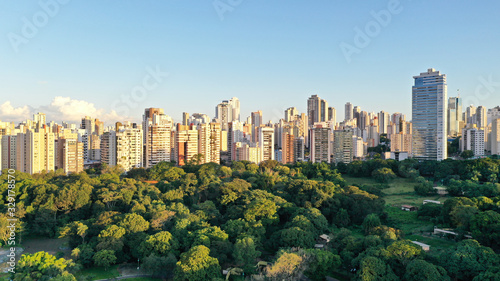 Aerial view of the largest park ofGoiania, Goias, Brazil with tropical forest and many residential buildings arround it