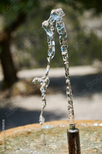 Fresh and crystalline water jet from a fountain