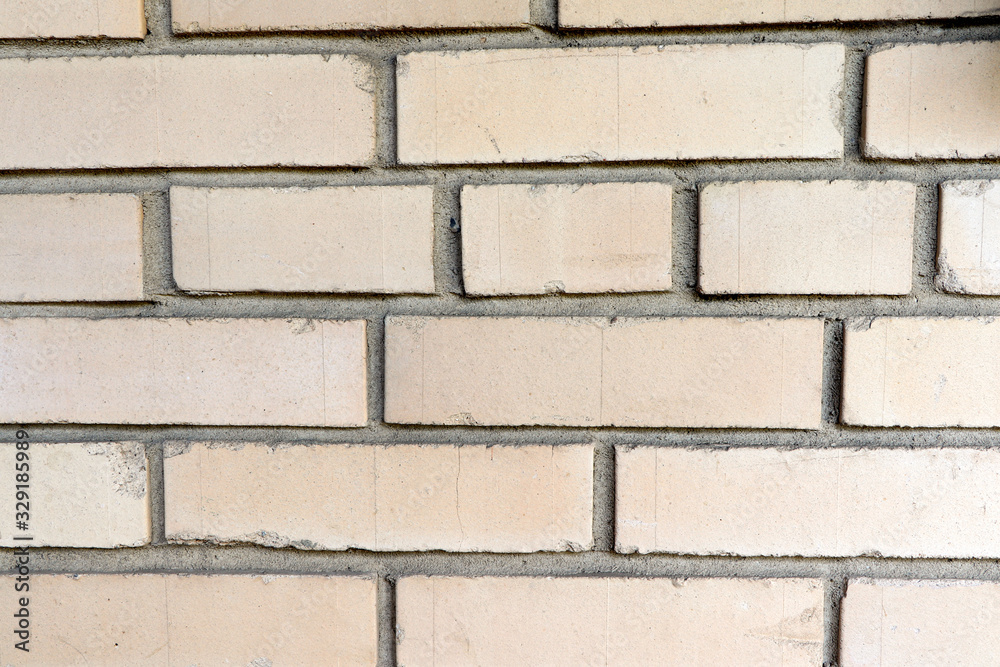 A light brick wall texture, background, pattern. A light brick wall texture, background, pattern.