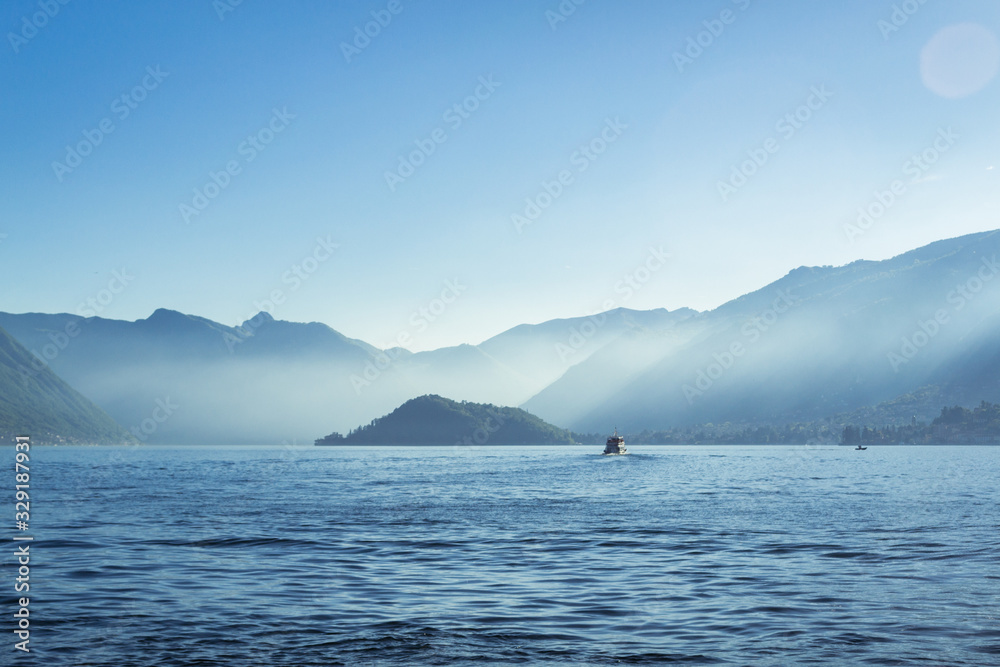 Blue Calm lake, misty morning