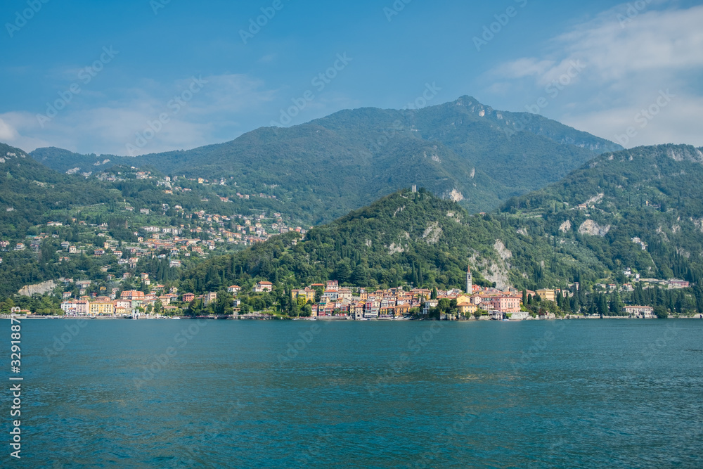 Varenna, Italy sits beside Lake Como beneath forested mountains