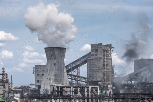 The largest air pollutant in city Dnipro Ukraine is coke-chemical plant. Flue gas stacks emit hundreds tons of harmful substances a years into the atmosphere. Industrial landscape.
