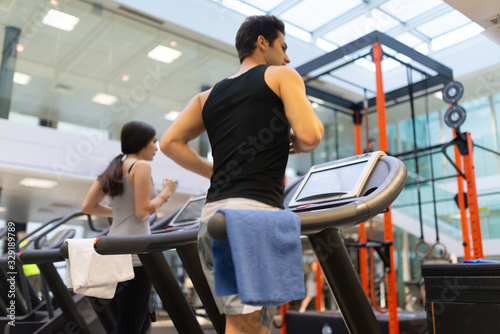 People running on the treadmill in a gym