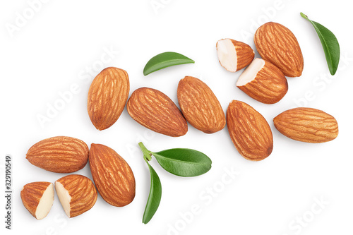 Almonds nuts with leaves isolated on white background with clipping path and full depth of field. Top view. Flat lay photo