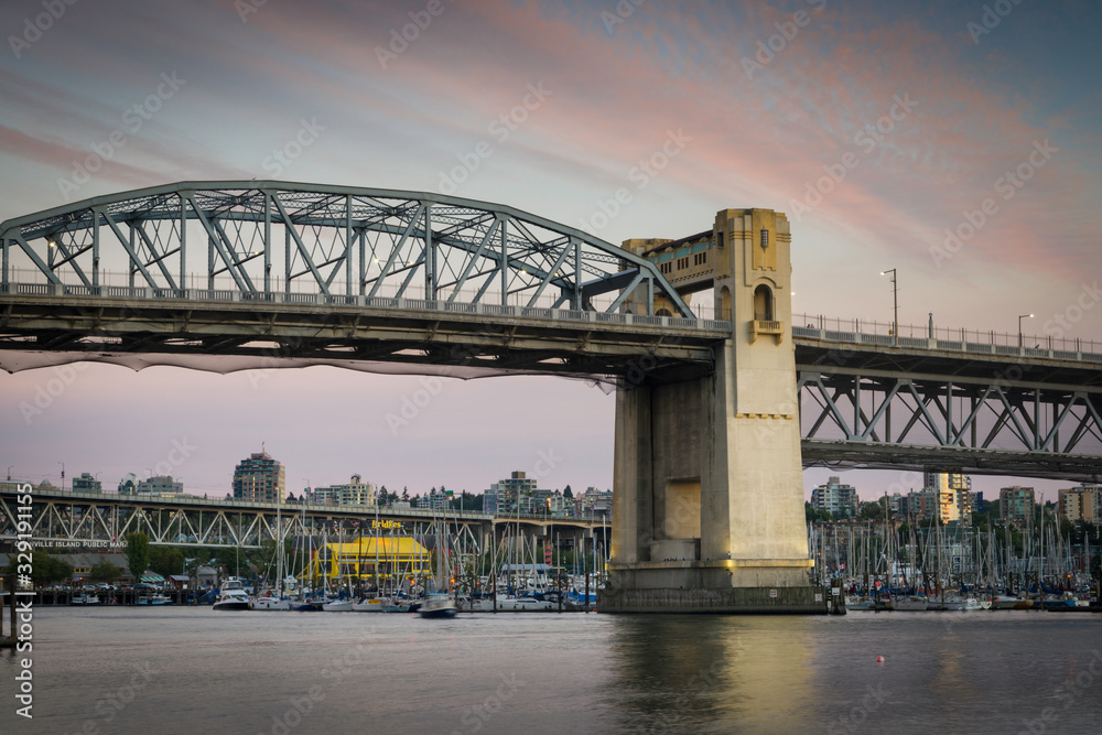 The Burrard Street Bridge spans False Creek, connecting Vancouver and Kitsilano, B.C. The Burrard Street Bridge spans False Creek, connecting Vancouver and Kitsilano, B.C.