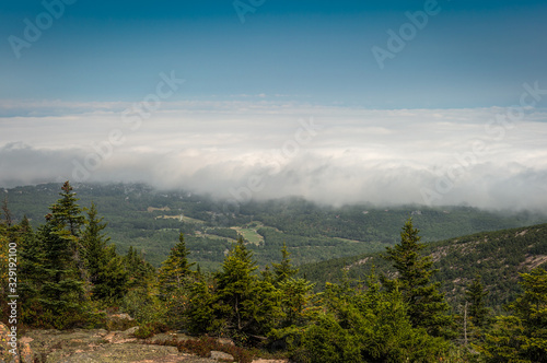 Fog Rolls Over Coastline In Acadia National Park