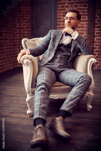 dandy in checked suit