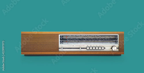 Old vintage radio In wooden case, retro style.