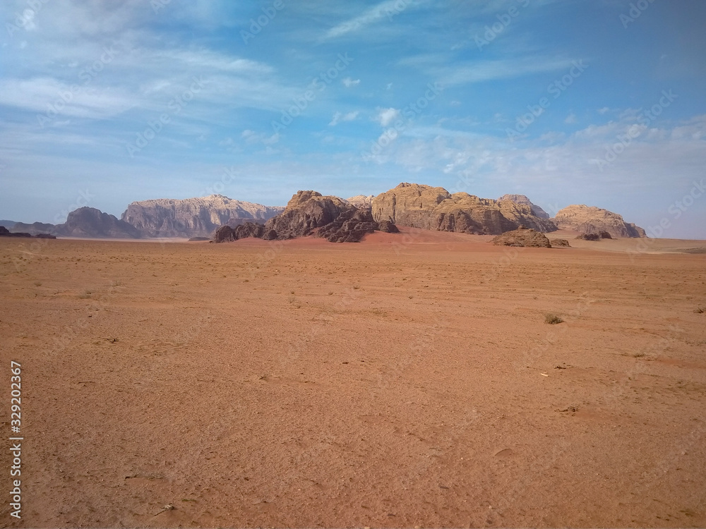 Naklejka premium rock formations and desert landscape of Wadi Rum